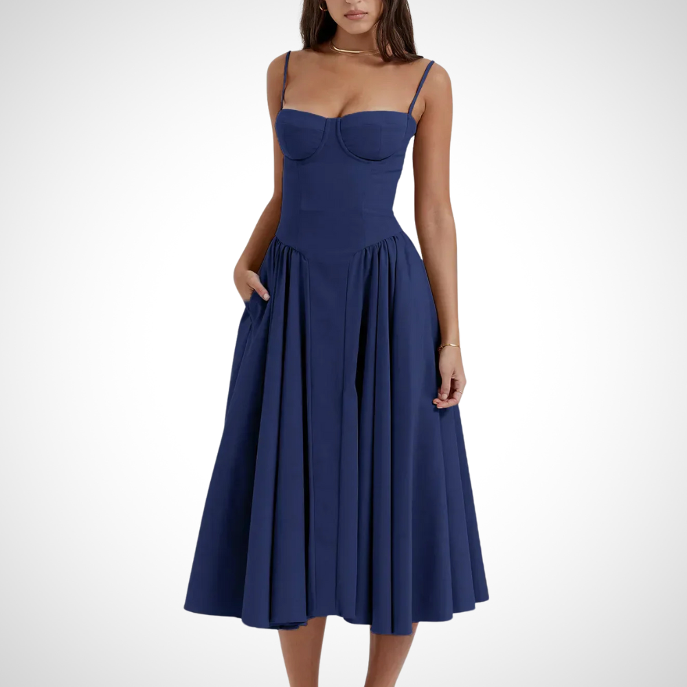 Stunning marine blue feminine pleated midi dress with a fitted bustier for women, offering a chic and flattering silhouette.