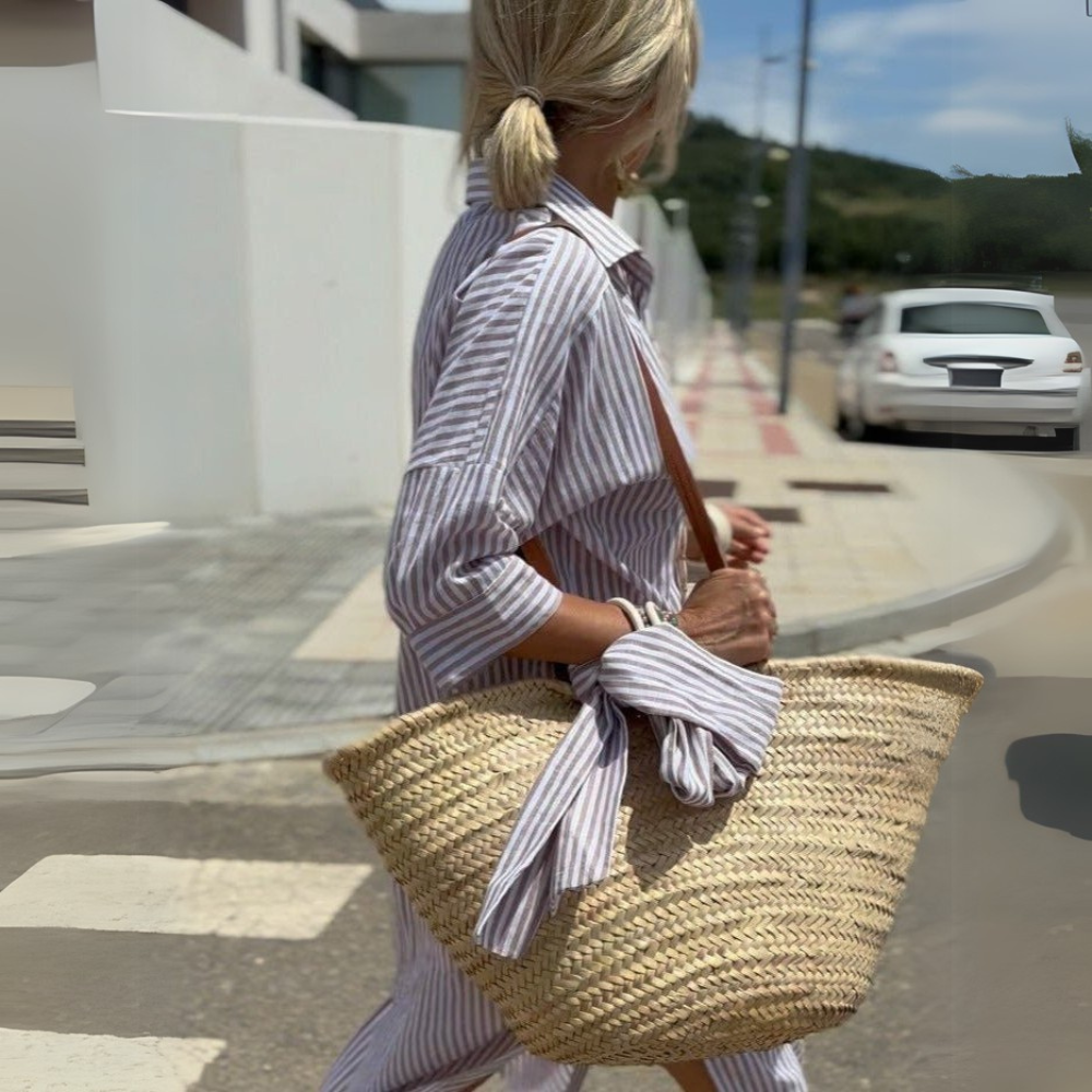 Gray striped oversized beach shirt dress for women with a button-down design, offering a chic and relaxed beach look.