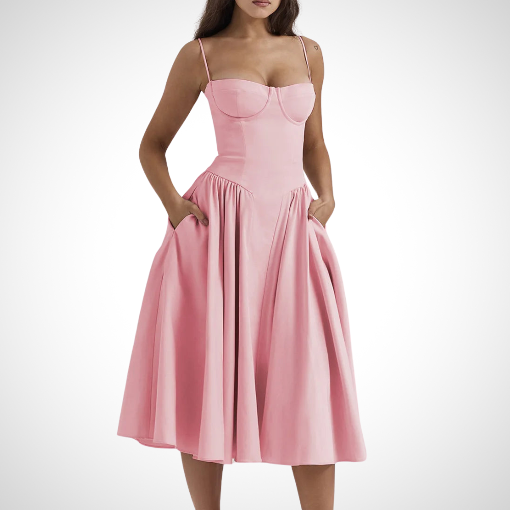 Feminine pleated midi dress in pink with a fitted bustier for women, ideal for a vibrant and flattering appearance.