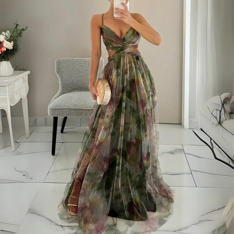 Flowy floral print maxi dress with V-neck for women in rich green hues, offering elegance and ease for any occasion.