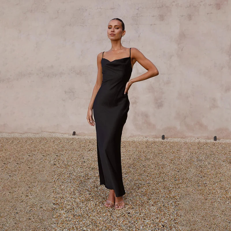 Classic black sophisticated satin wedding guest dress with a flattering fit for women, perfect for evening events and weddings.